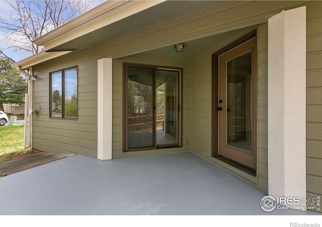 718 Brookhaven Ct, Fort Collins, CO 80525 - view of exterior entry featuring a patio