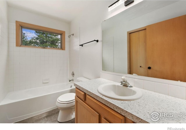 718 Brookhaven Ct, Fort Collins, CO 80525 - bathroom featuring vanity, shower / bathtub combination, and toilet
