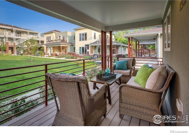 balcony with outdoor lounge area and a residential view