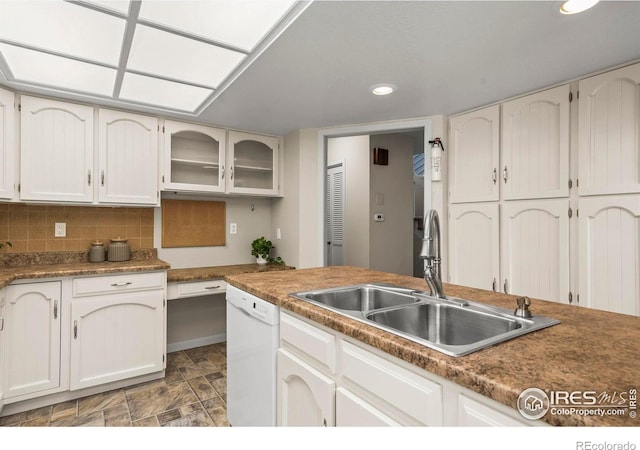 4950 Sundance Sq, Boulder, CO 80301 - kitchen with a sink, dishwasher, recessed lighting, glass insert cabinets, and backsplash