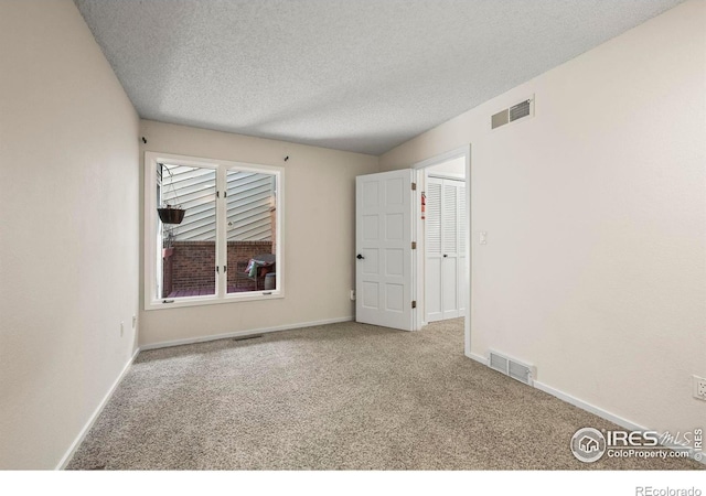 4950 Sundance Sq, Boulder, CO 80301 - carpeted spare room featuring a textured ceiling and baseboards