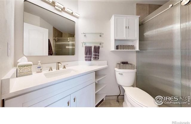 full bathroom with toilet, a shower with door, and vanity