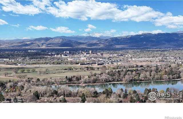 property view of mountains featuring a water view