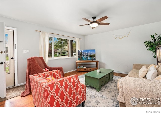 1208 Briarwood Rd, Fort Collins, CO 80521 - living area featuring wood finished floors, ceiling fan, and baseboards