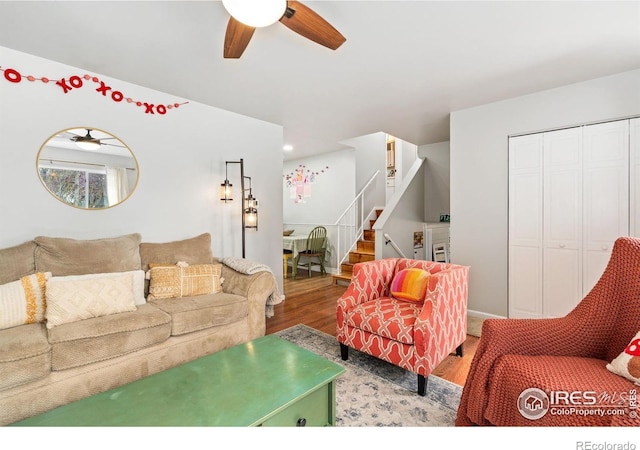 1208 Briarwood Rd, Fort Collins, CO 80521 - living room with a ceiling fan, wood finished floors, and stairs