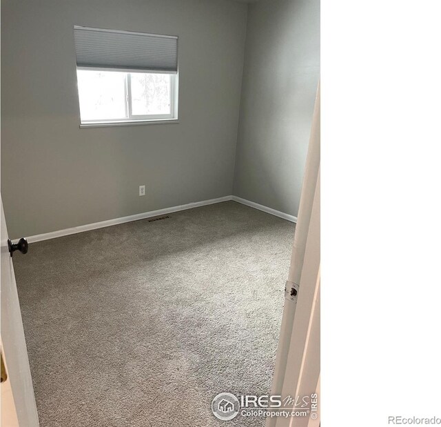 1208 Briarwood Rd, Fort Collins, CO 80521 - spare room featuring carpet flooring and baseboards