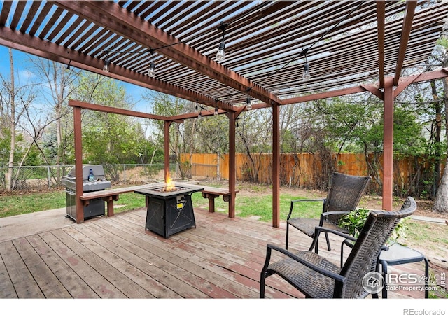 1208 Briarwood Rd, Fort Collins, CO 80521 - wooden deck featuring an outdoor fire pit, a fenced backyard, grilling area, and a pergola