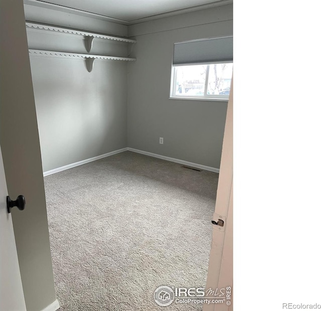 1208 Briarwood Rd, Fort Collins, CO 80521 - empty room with carpet floors and baseboards