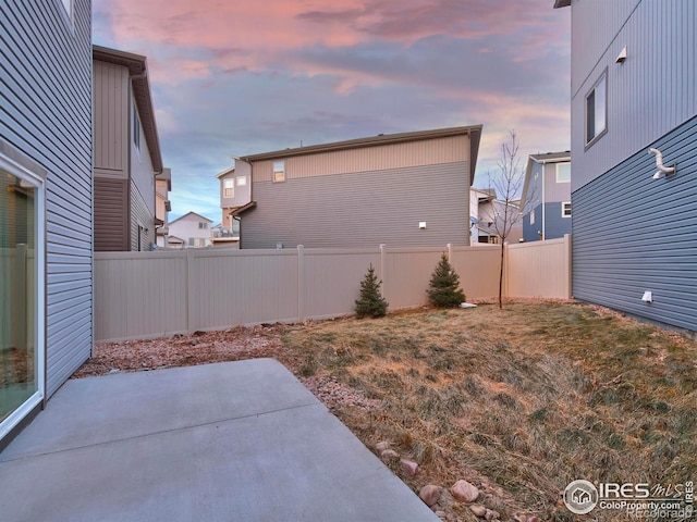 view of yard featuring a fenced backyard and a patio area