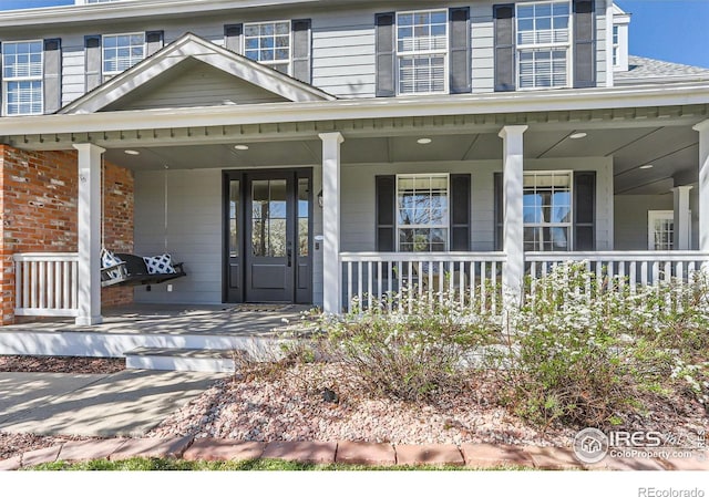 entrance to property with a porch
