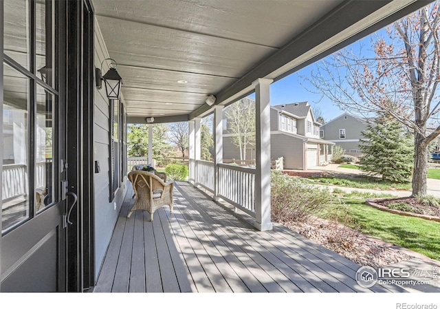 wooden terrace featuring a porch