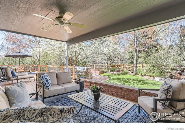 view of patio / terrace featuring a ceiling fan, an outdoor hangout area, and a fenced backyard