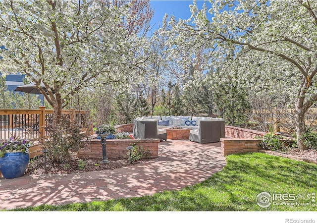 view of patio featuring a fire pit