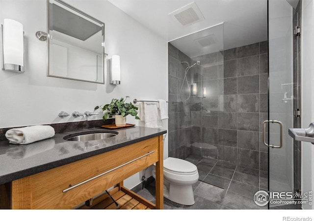 1360 Walnut St Unit 211, Boulder, CO 80302 - full bathroom featuring vanity, a tile shower, toilet, and visible vents
