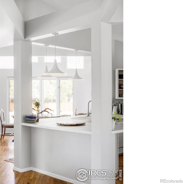 kitchen with wood finished floors