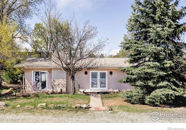 1891 Orchard Ave, Boulder, CO 80304 - view of front of house featuring french doors