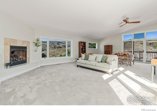 319 Camino Bosque, Boulder, CO 80302 - carpeted living area with ceiling fan, vaulted ceiling, and a tile fireplace