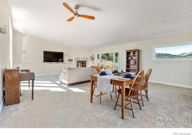 319 Camino Bosque, Boulder, CO 80302 - carpeted dining room with ceiling fan, baseboards, and a fireplace