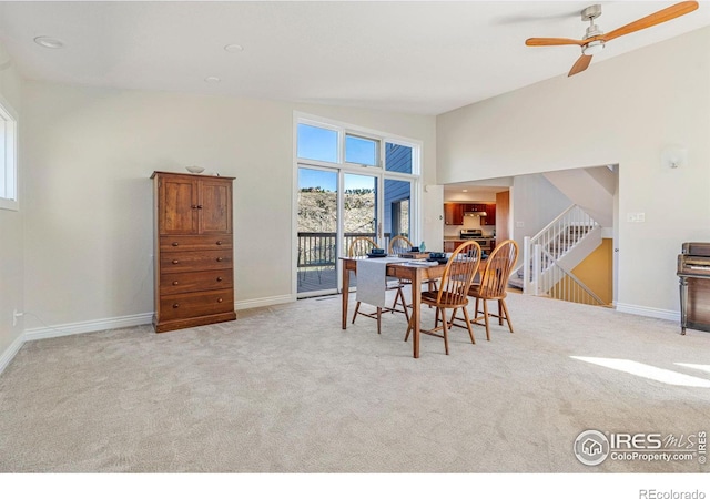 319 Camino Bosque, Boulder, CO 80302 - dining area featuring baseboards, carpet, ceiling fan, and stairway