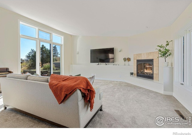 319 Camino Bosque, Boulder, CO 80302 - living room featuring carpet floors and a tile fireplace