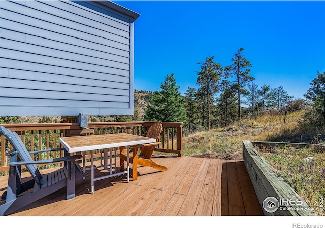 319 Camino Bosque, Boulder, CO 80302 - wooden terrace with outdoor dining space