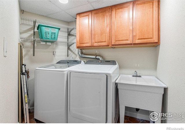 319 Camino Bosque, Boulder, CO 80302 - laundry room with separate washer and dryer, cabinet space, and tile patterned floors