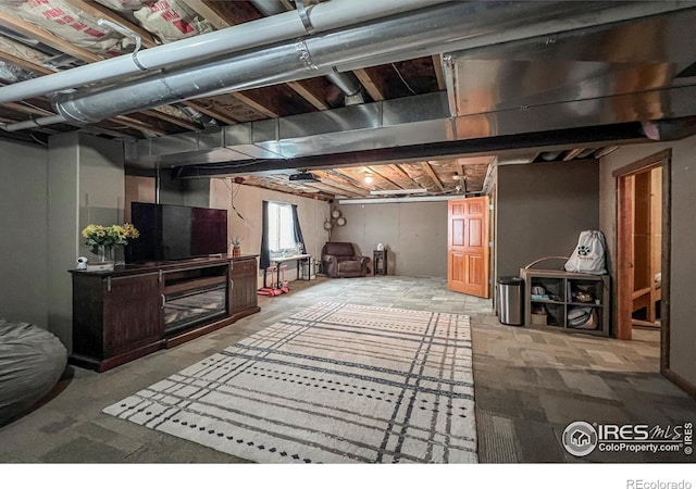 11669 Montgomery Cir, Longmont, CO 80504 - basement with a fireplace