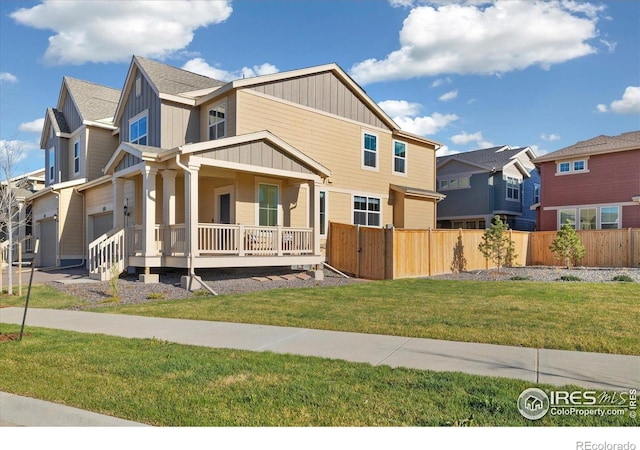 2260 Crescent Cir, Erie, CO 80026 - view of front facade featuring covered porch, board and batten siding, and a residential view
