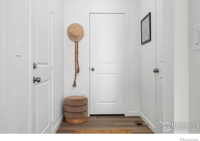 2260 Crescent Cir, Erie, CO 80026 - corridor with wood finished floors and baseboards