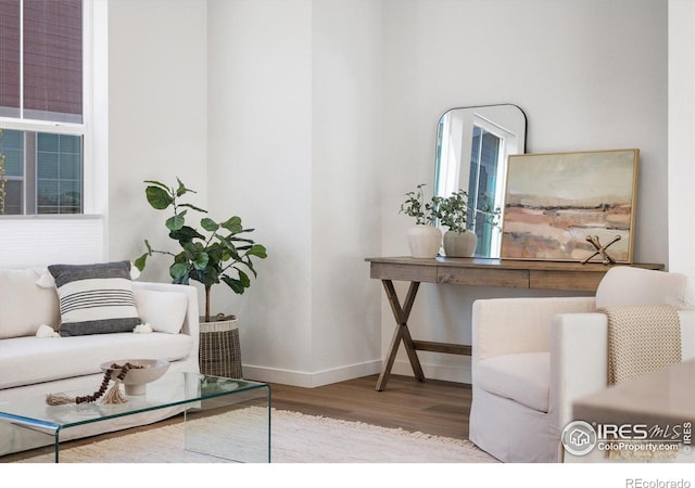 2260 Crescent Cir, Erie, CO 80026 - living area with wood finished floors and baseboards