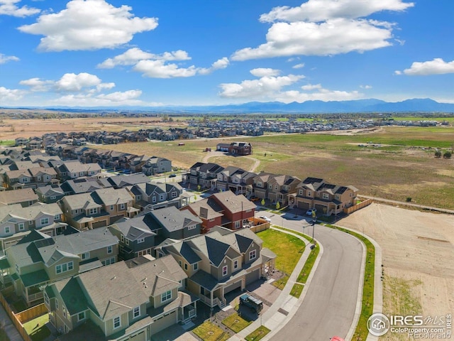 2260 Crescent Cir, Erie, CO 80026 - aerial view of residential area featuring a mountainous background