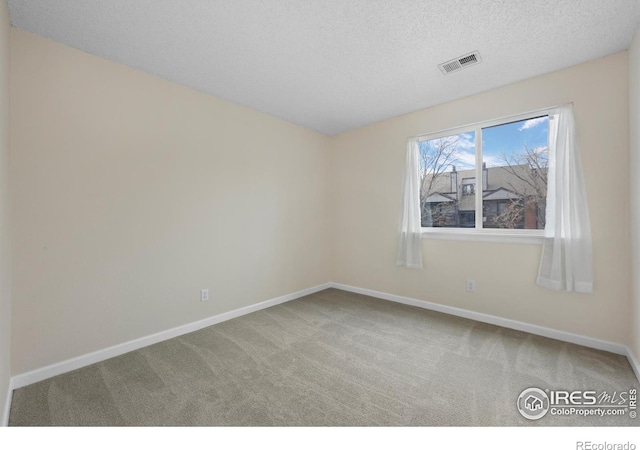6385 Oak St Unit 301, Arvada, CO 80004 - empty room with carpet and a textured ceiling