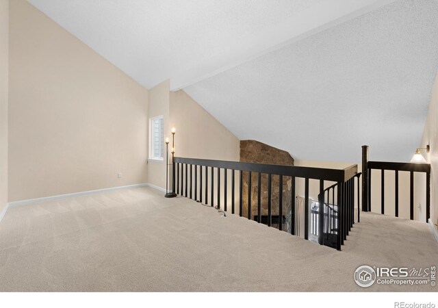6385 Oak St Unit 301, Arvada, CO 80004 - bonus room featuring carpet flooring and lofted ceiling