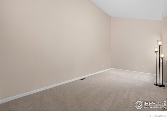 6385 Oak St Unit 301, Arvada, CO 80004 - unfurnished room featuring carpet floors and lofted ceiling