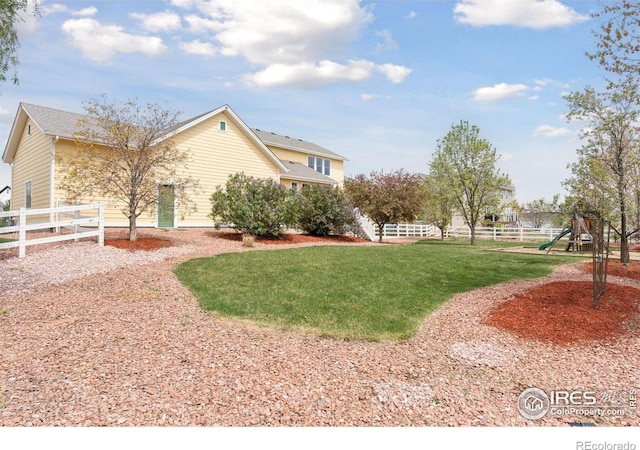 3530 Willow Rd, Frederick, CO 80504 - view of yard featuring a playground and fence