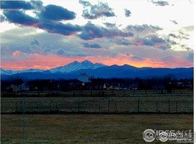 mountain view featuring a rural view