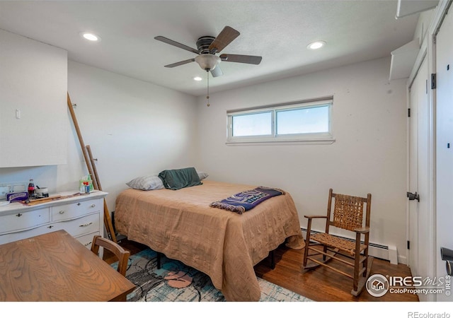 bedroom featuring ceiling fan, recessed lighting, and wood finished floors