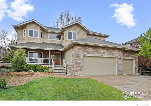 2275 Schooner St, Lafayette, CO 80026 - traditional-style home with roof with shingles, an attached garage, a front lawn, a porch, and concrete driveway