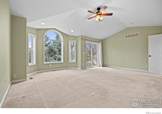 2275 Schooner St, Lafayette, CO 80026 - carpeted empty room featuring visible vents, a ceiling fan, baseboards, and lofted ceiling