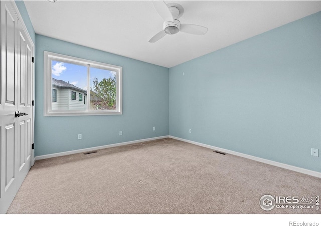 2275 Schooner St, Lafayette, CO 80026 - carpeted spare room featuring a ceiling fan, baseboards, and visible vents