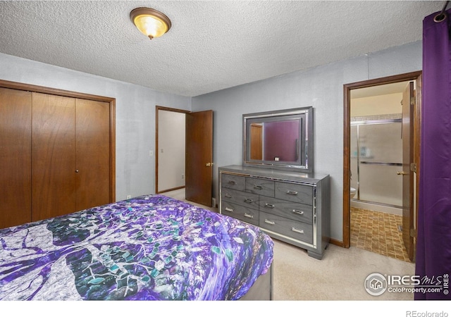 1183 38th Ave, Greeley, CO 80634 - bedroom with a closet, light colored carpet, and a textured ceiling