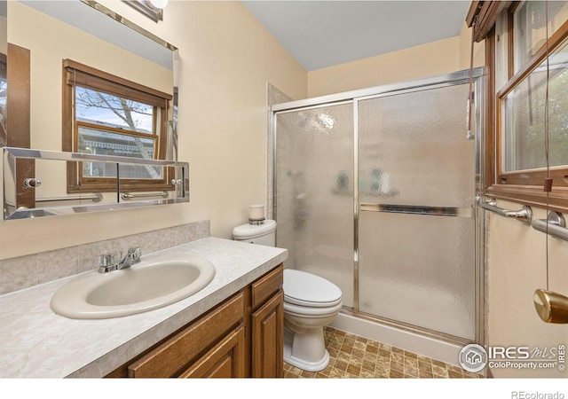 1183 38th Ave, Greeley, CO 80634 - bathroom with vanity and a shower stall