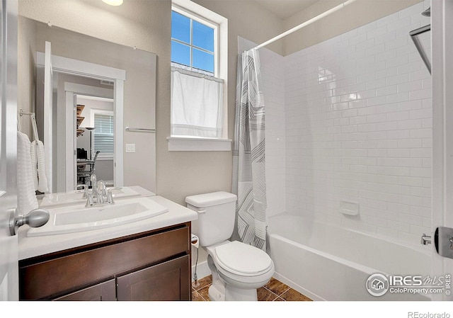 541 Hoyt Ln, Lafayette, CO 80026 - bathroom featuring vanity, tile patterned floors, toilet, and shower / tub combo
