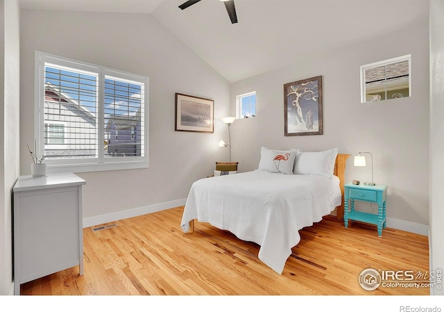 541 Hoyt Ln, Lafayette, CO 80026 - bedroom featuring baseboards, visible vents, light wood-style flooring, and lofted ceiling