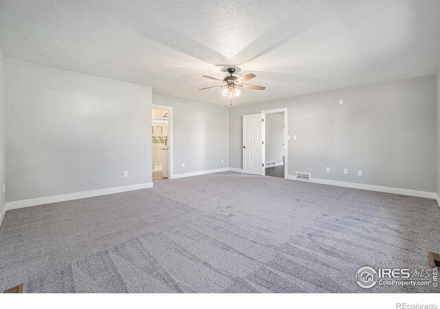 4121 Silene Pl, Loveland, CO 80537 - carpeted empty room with a ceiling fan, baseboards, visible vents, and a textured ceiling