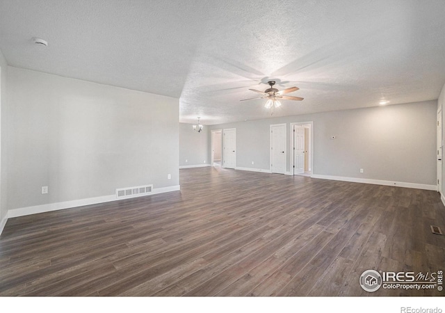 4121 Silene Pl, Loveland, CO 80537 - unfurnished living room with a ceiling fan, a textured ceiling, visible vents, baseboards, and dark wood-type flooring