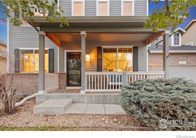 property entrance with a porch