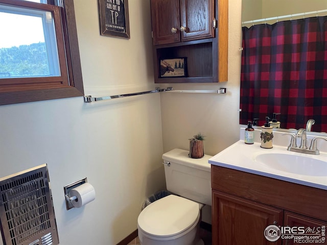 134 Swift Deer Rd, Red Feather Lakes, CO 80545 - bathroom featuring toilet, vanity, and a shower with curtain