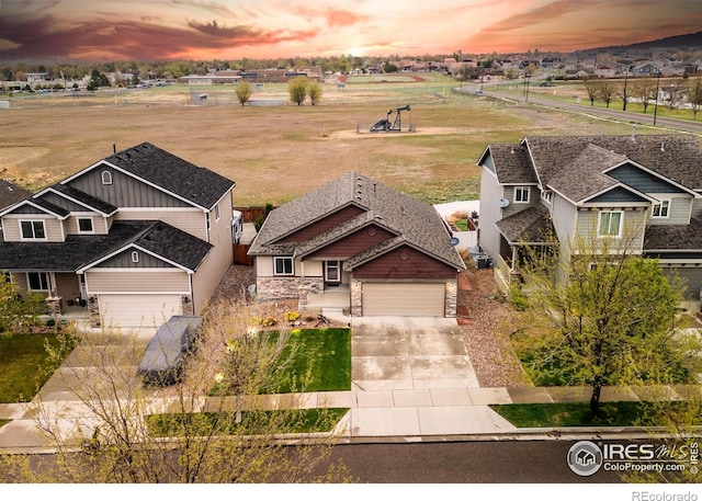 6659 12th St, Frederick, CO 80530 - view of aerial view at dusk