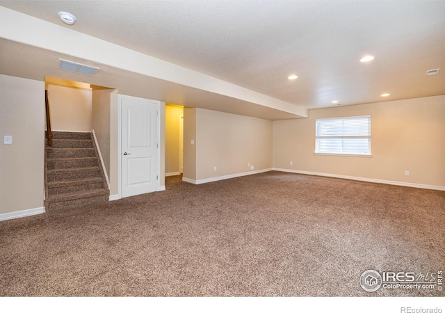 6659 12th St, Frederick, CO 80530 - basement with stairway, baseboards, carpet, and visible vents